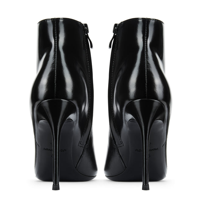 Kendall ankle booties with elongated pointed toe and high-gloss black finish